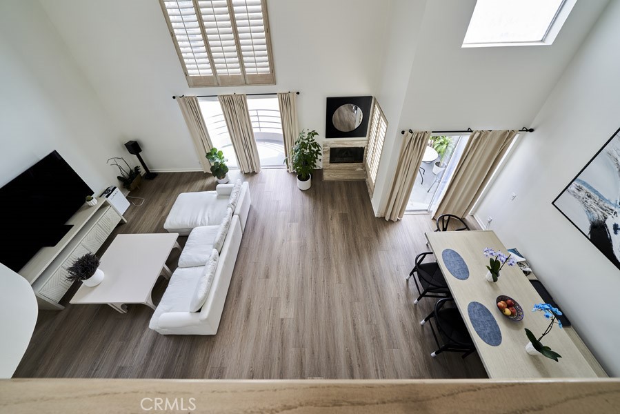 1617 South Beverly Glen Boulevard, Unit 303 Los Angeles, CA 90024 - Photo 8 of 55 a living room with furniture and a flat screen tv