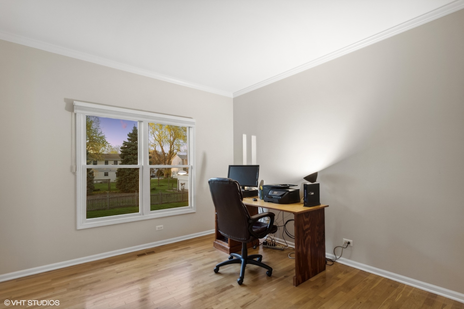 2223 Joyce Lane Naperville, IL 60564 - Photo 12 of 36 a view of a workspace with furniture and a window