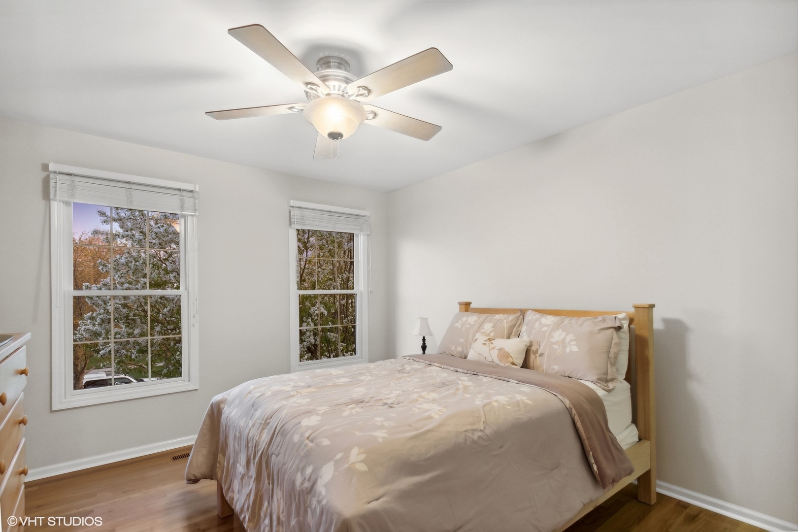 2223 Joyce Lane Naperville, IL 60564 - Photo 19 of 36 a bedroom with a large bed and a window