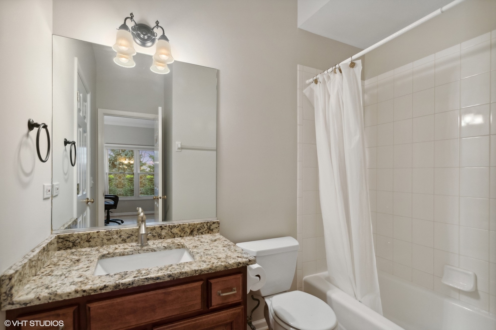 2223 Joyce Lane Naperville, IL 60564 - Photo 21 of 36 a bathroom with a granite countertop sink toilet and shower