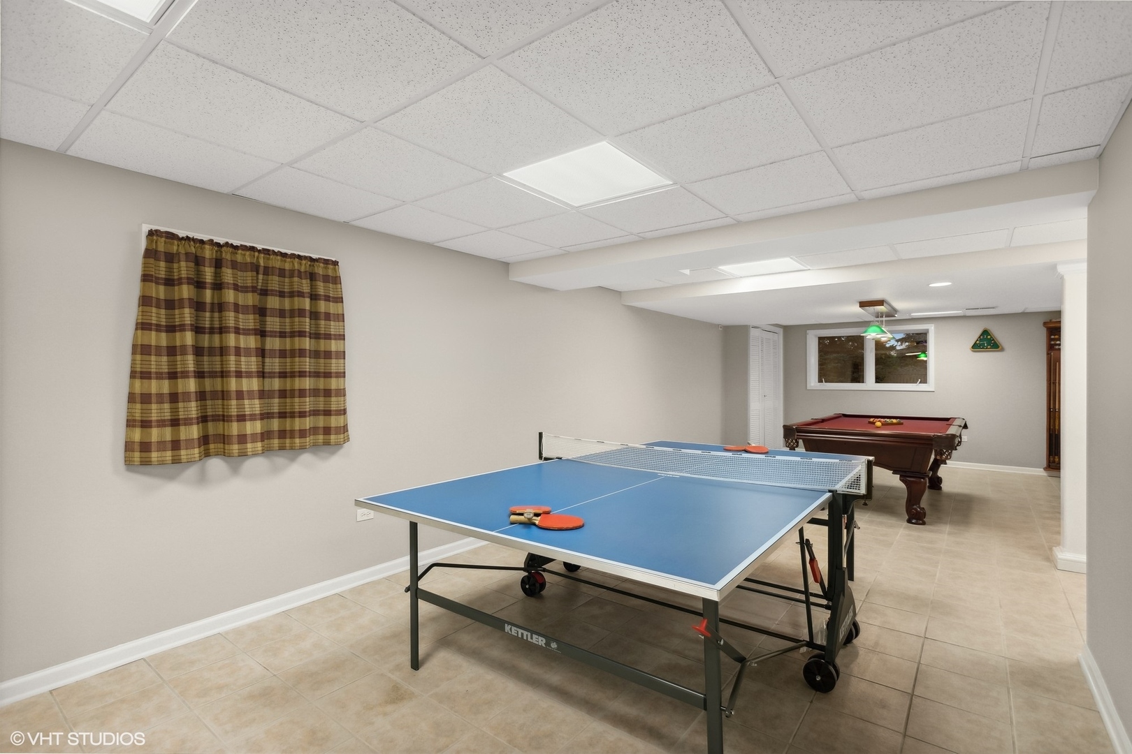 2223 Joyce Lane Naperville, IL 60564 - Photo 23 of 36 a living room with a table and a window