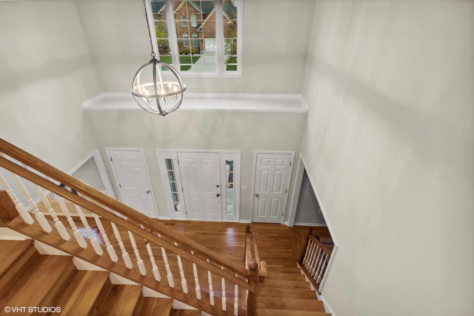 2223 Joyce Lane Naperville, IL 60564 - Photo 3 of 36 a view of a hall with wooden floor