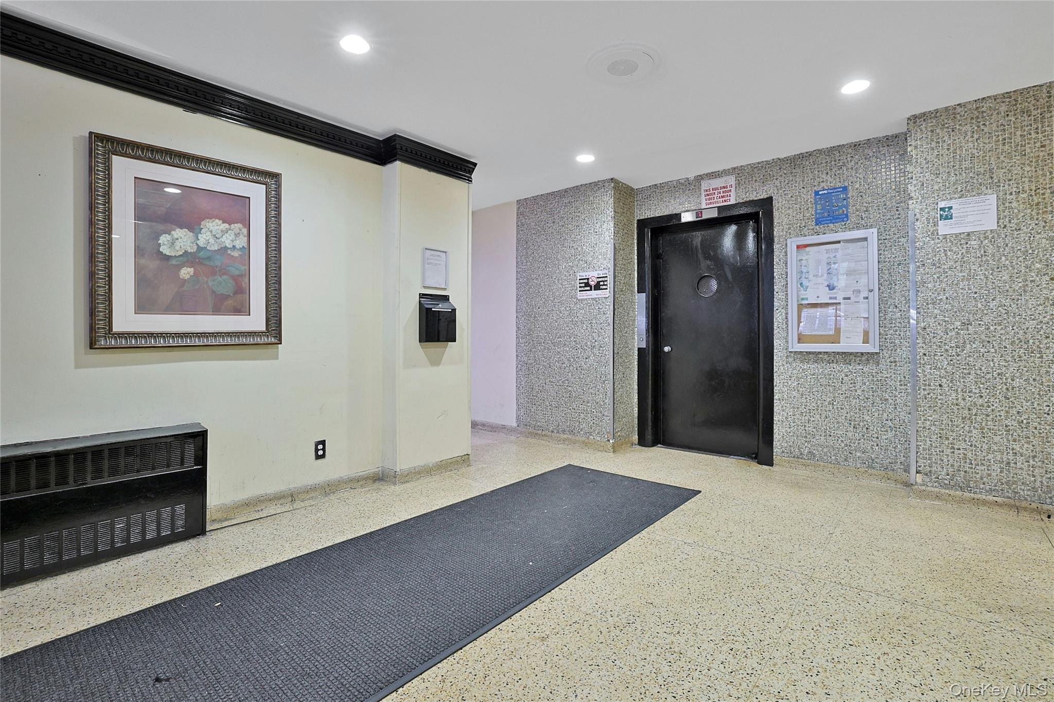 2545 Sedgwick Avenue, Unit 3 Bronx, NY 10468 - Photo 5 of 15 Community lobby with recessed lighting and crown molding