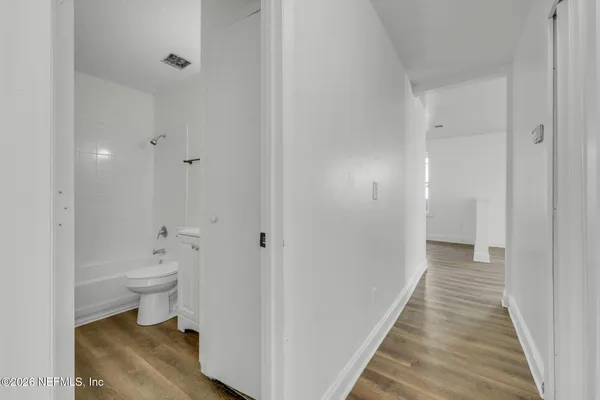 a bathroom with a toilet sink