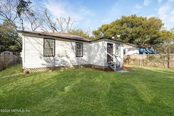 a front view of house with yard