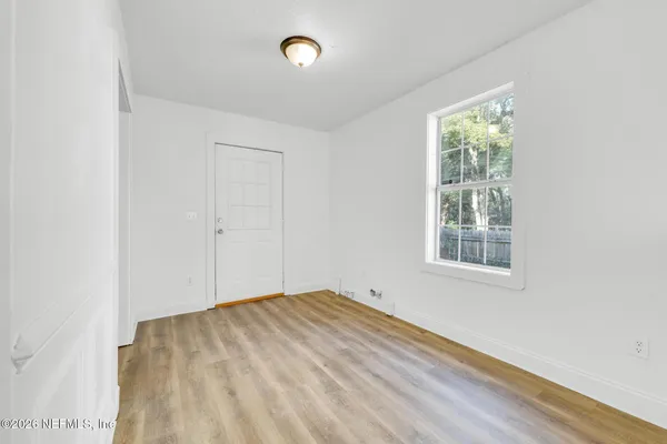 an empty room with windows