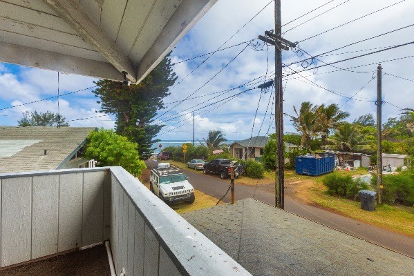 1054 Kealoha Road Kapaa, HI 96746 - Photo 14 of 18 a view of a balcony with potted plants
