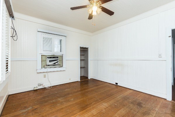 1054 Kealoha Road Kapaa, HI 96746 - Photo 5 of 18 a view of empty room with wooden floor and fan
