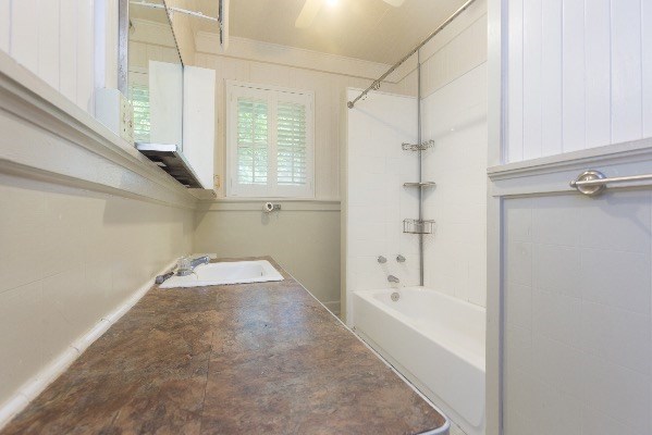 1054 Kealoha Road Kapaa, HI 96746 - Photo 6 of 18 a bathroom with a bathtub and a shower