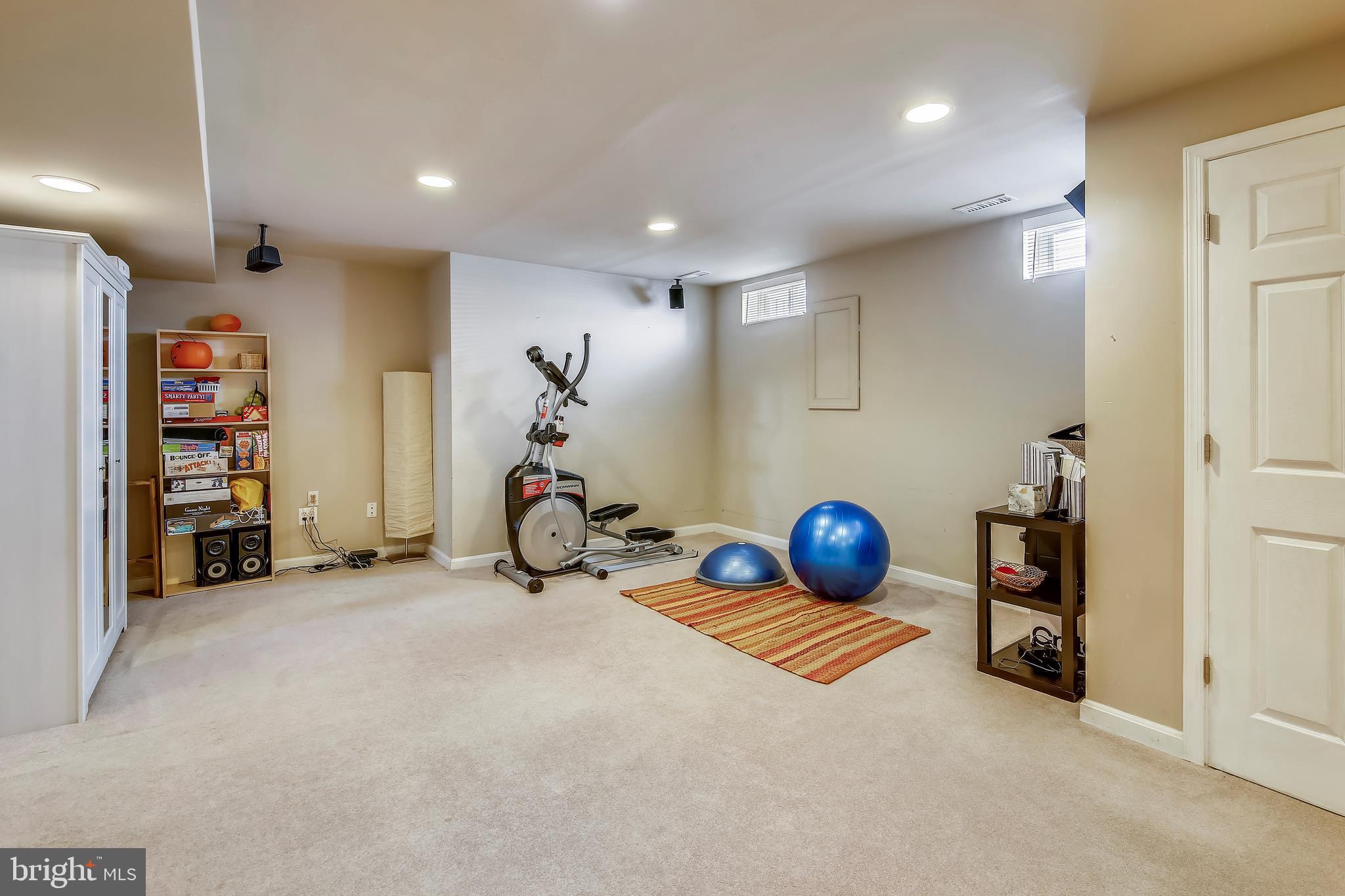 18123 Coachmans Road Germantown, MD 20874 - Photo 36 of 46 Finished lower level rec room