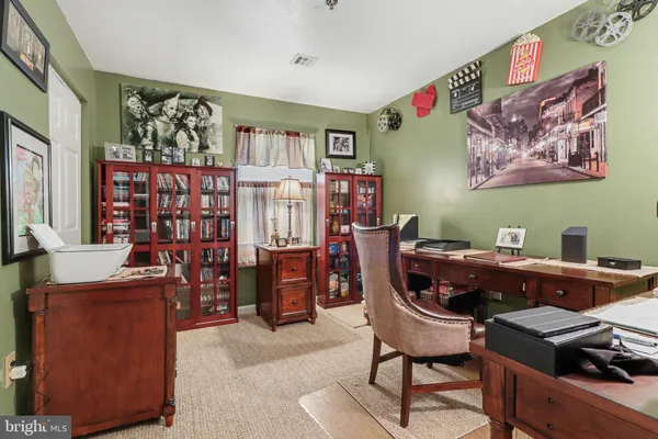 a workspace with furniture and window