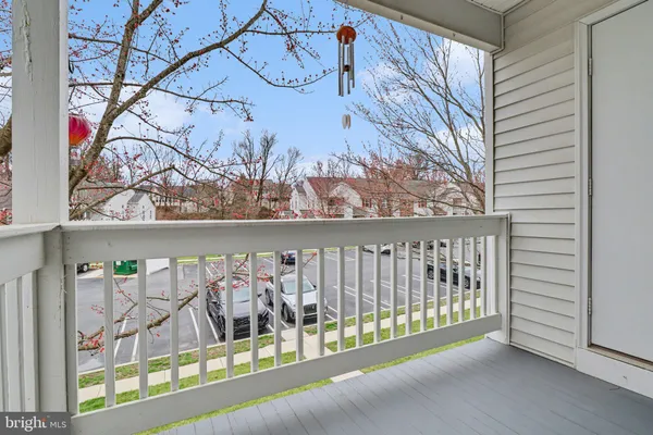 a view of a parked cars in front of a building