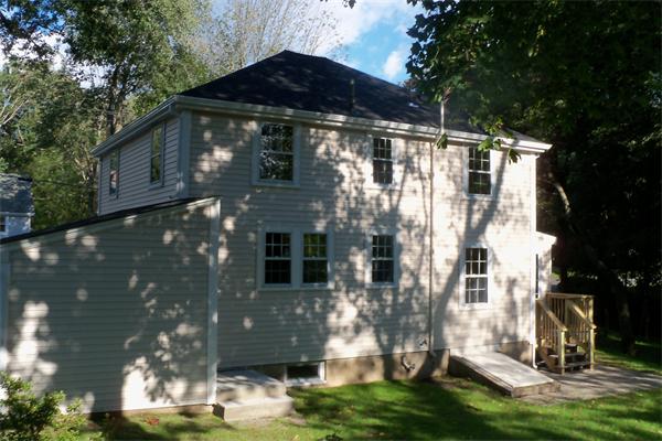 52 Martin Road Wellesley, MA 02481 - Photo 3 of 10 a view of a house with a yard