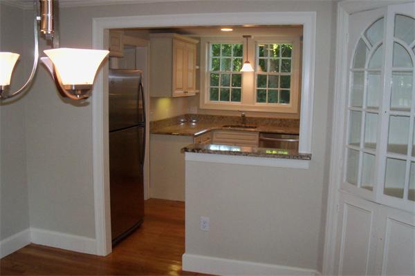 52 Martin Road Wellesley, MA 02481 - Photo 8 of 10 a bathroom with a sink and a mirror