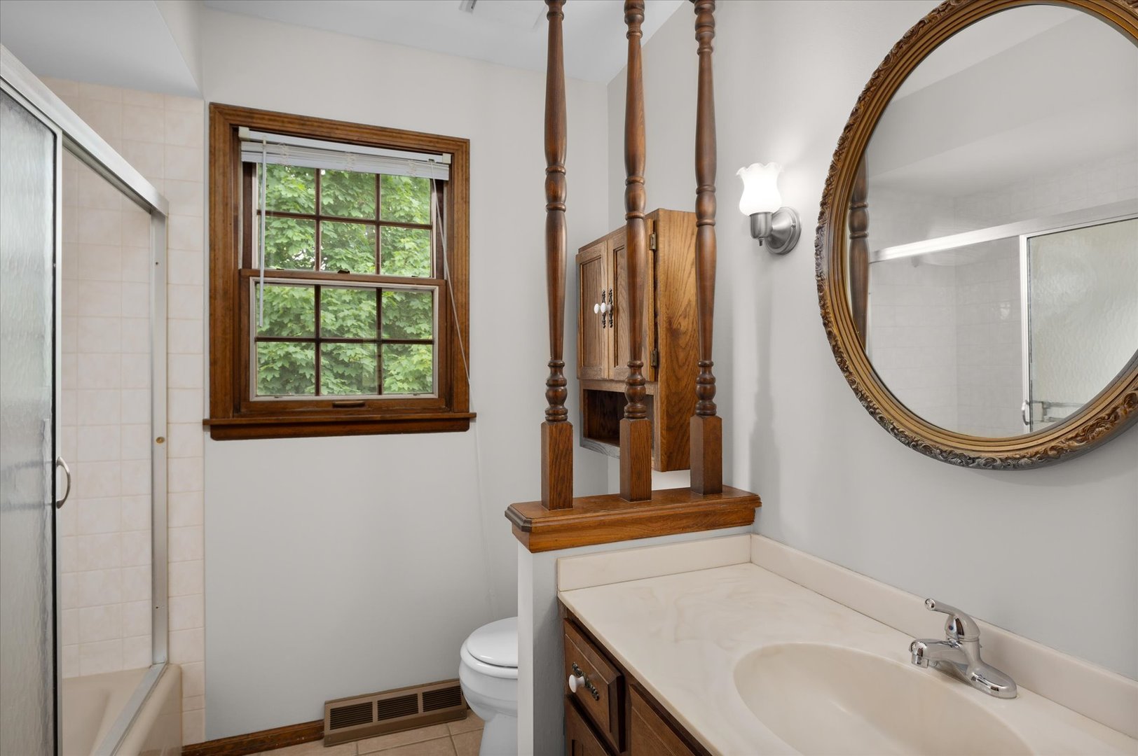 22 Cedar Gate Circle Sugar Grove, IL 60554 - Photo 25 of 35 a bathroom with a toilet a sink and a mirror