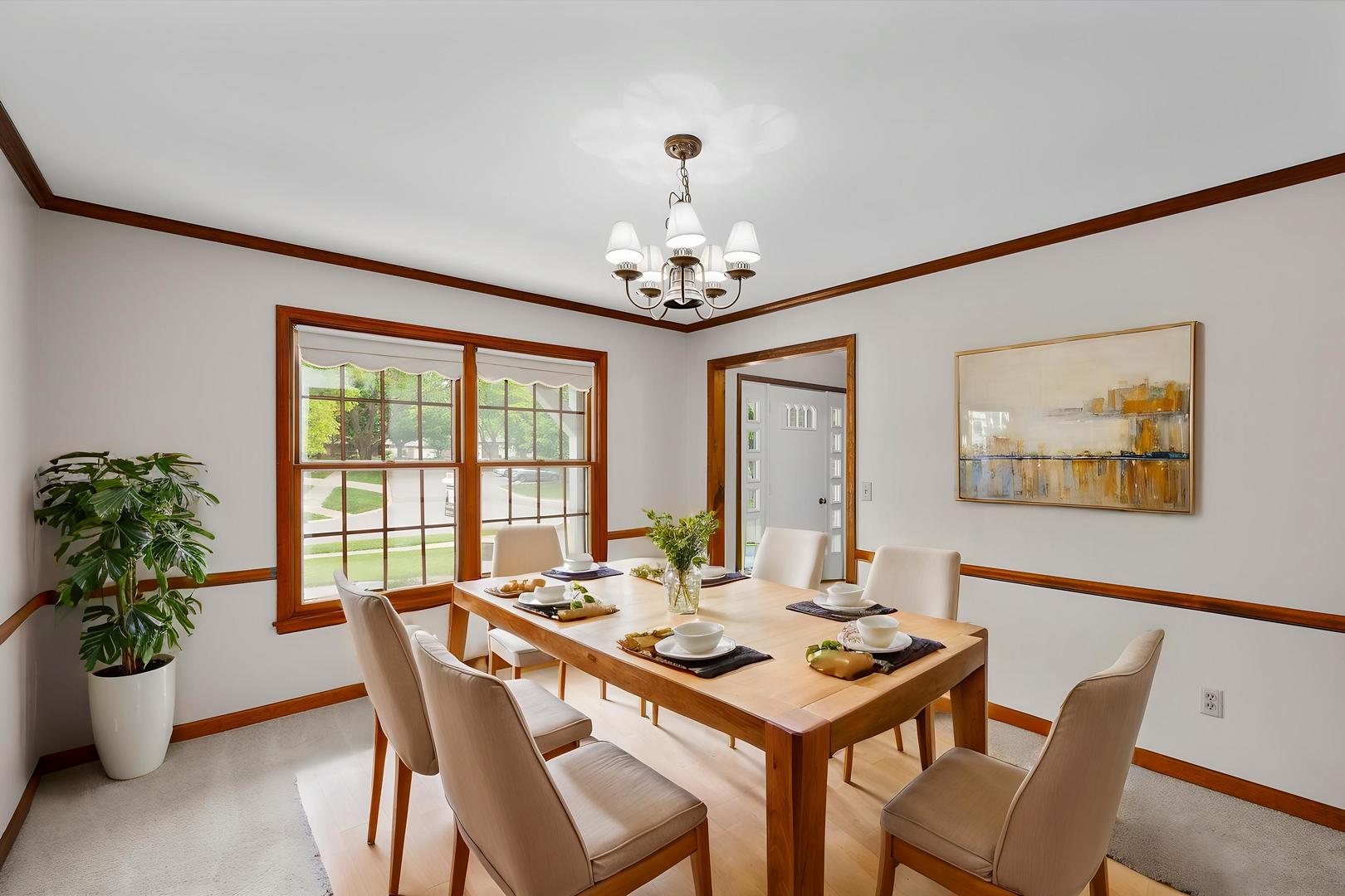 22 Cedar Gate Circle Sugar Grove, IL 60554 - Photo 3 of 35 a view of a dining room with furniture window and wooden floor