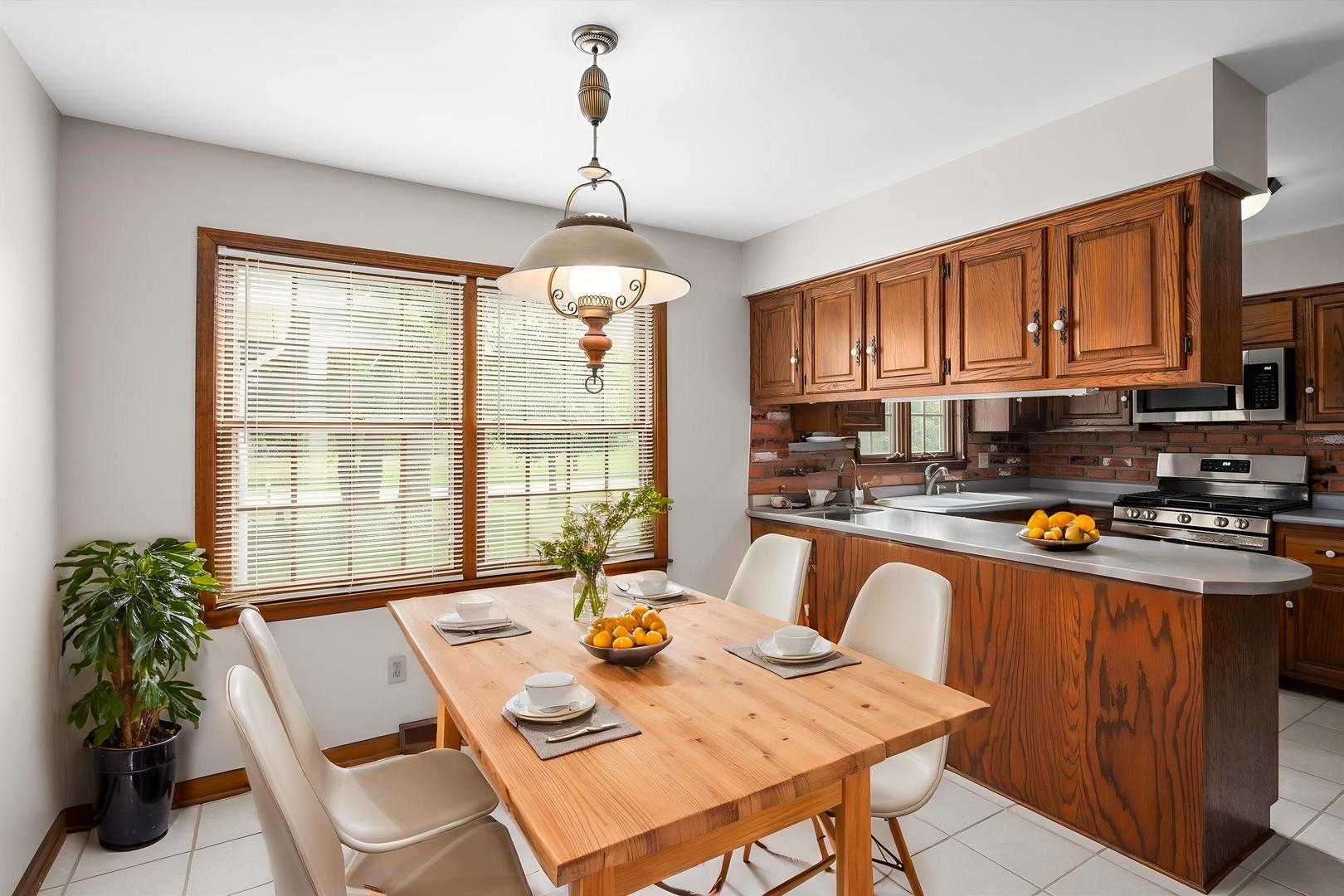 22 Cedar Gate Circle Sugar Grove, IL 60554 - Photo 7 of 35 a view of a dining room with furniture window and outside view