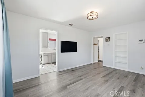 a view of a livingroom with wooden floor