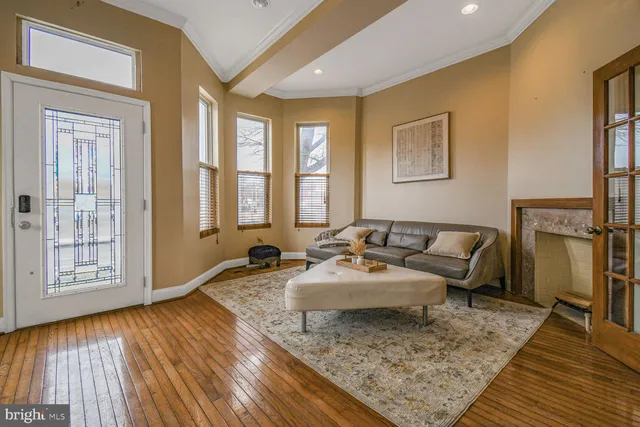a living room with furniture and a rug