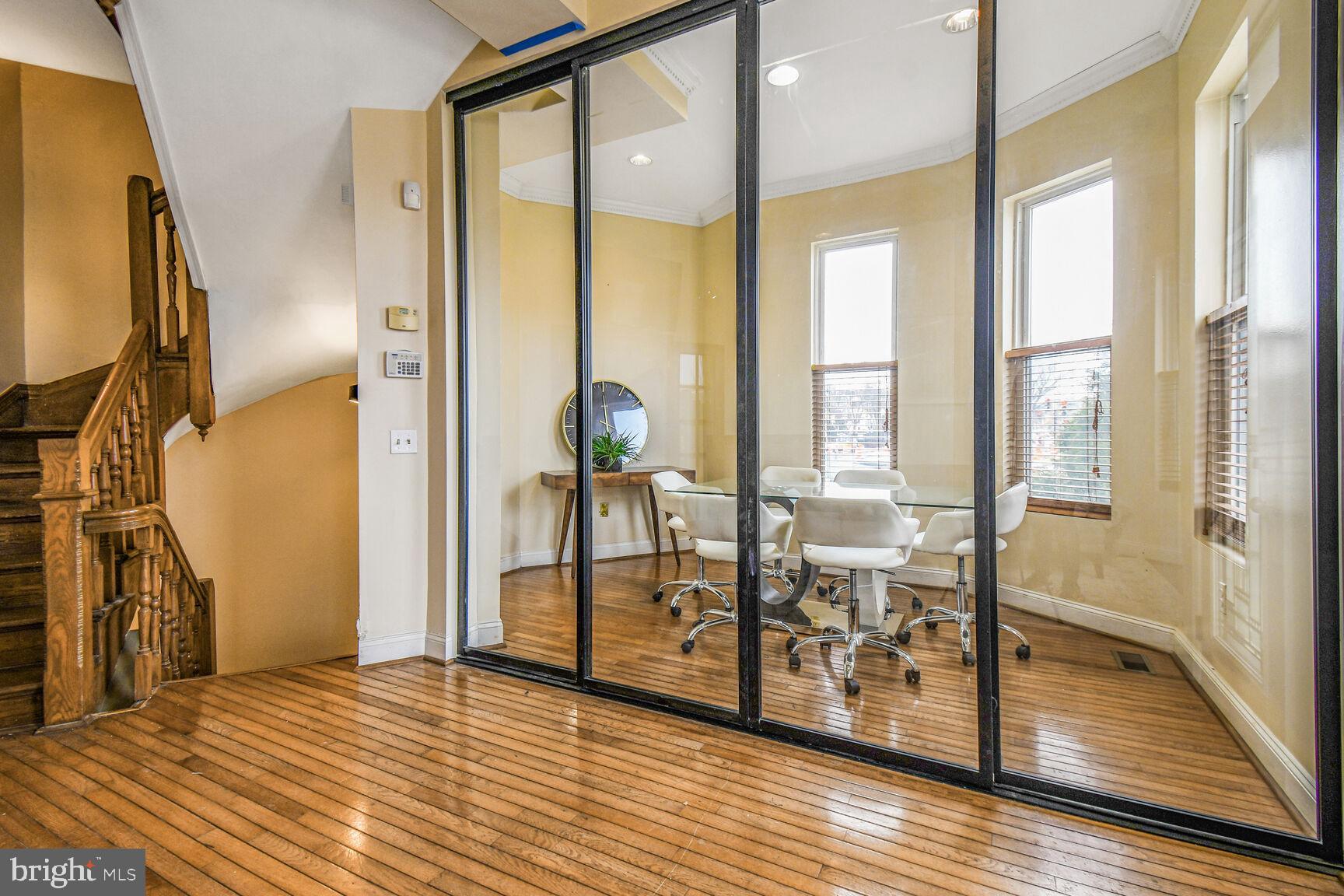 414 Florida Avenue Northwest Washington, DC 20001 - Photo 21 of 24 a view of an entryway with wooden floor and door