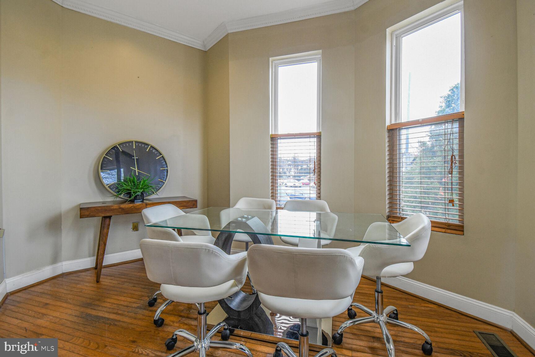 414 Florida Avenue Northwest Washington, DC 20001 - Photo 4 of 24 a living room with furniture and a window