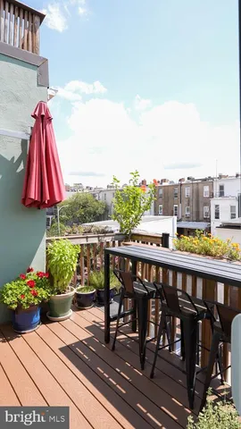 a view of a chairs and table on the terrace