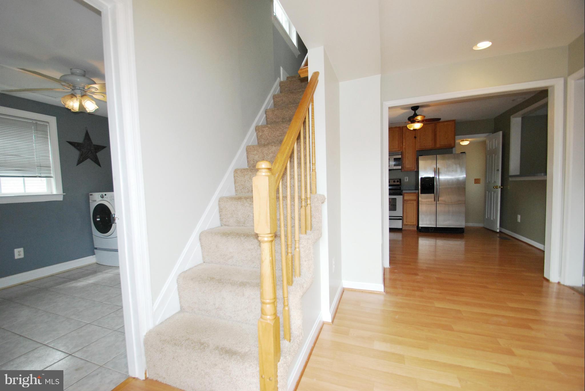 957 Tidewater Road Pasadena, MD 21122 - Photo 12 of 30 Laundry Room / Staircase / Dining Area