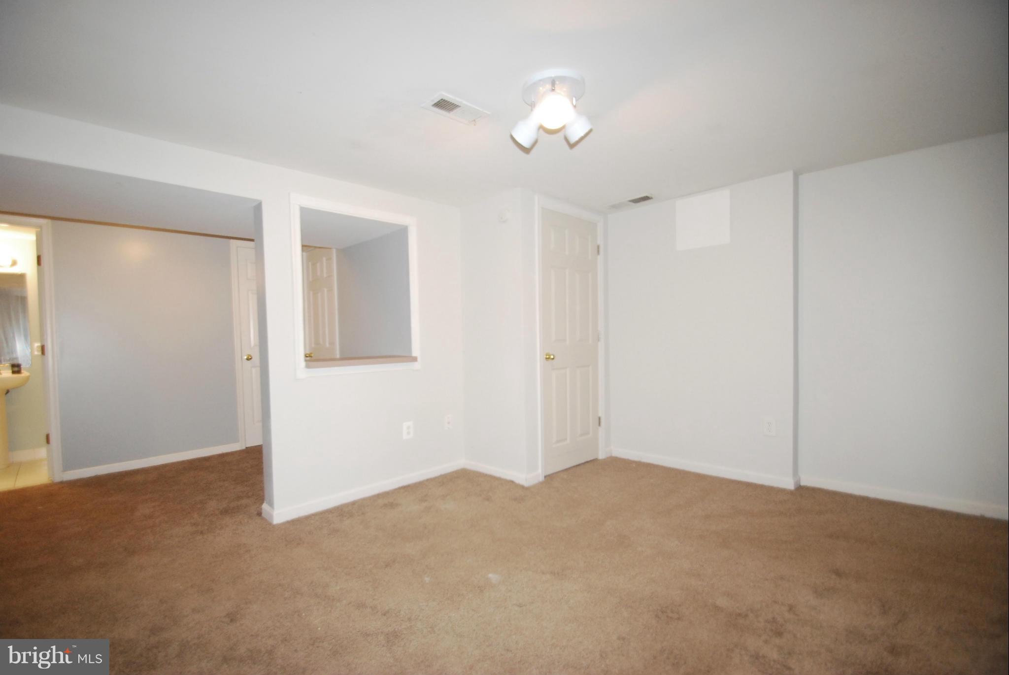 957 Tidewater Road Pasadena, MD 21122 - Photo 15 of 30 Lower Level Living Area (In-Law Suite)