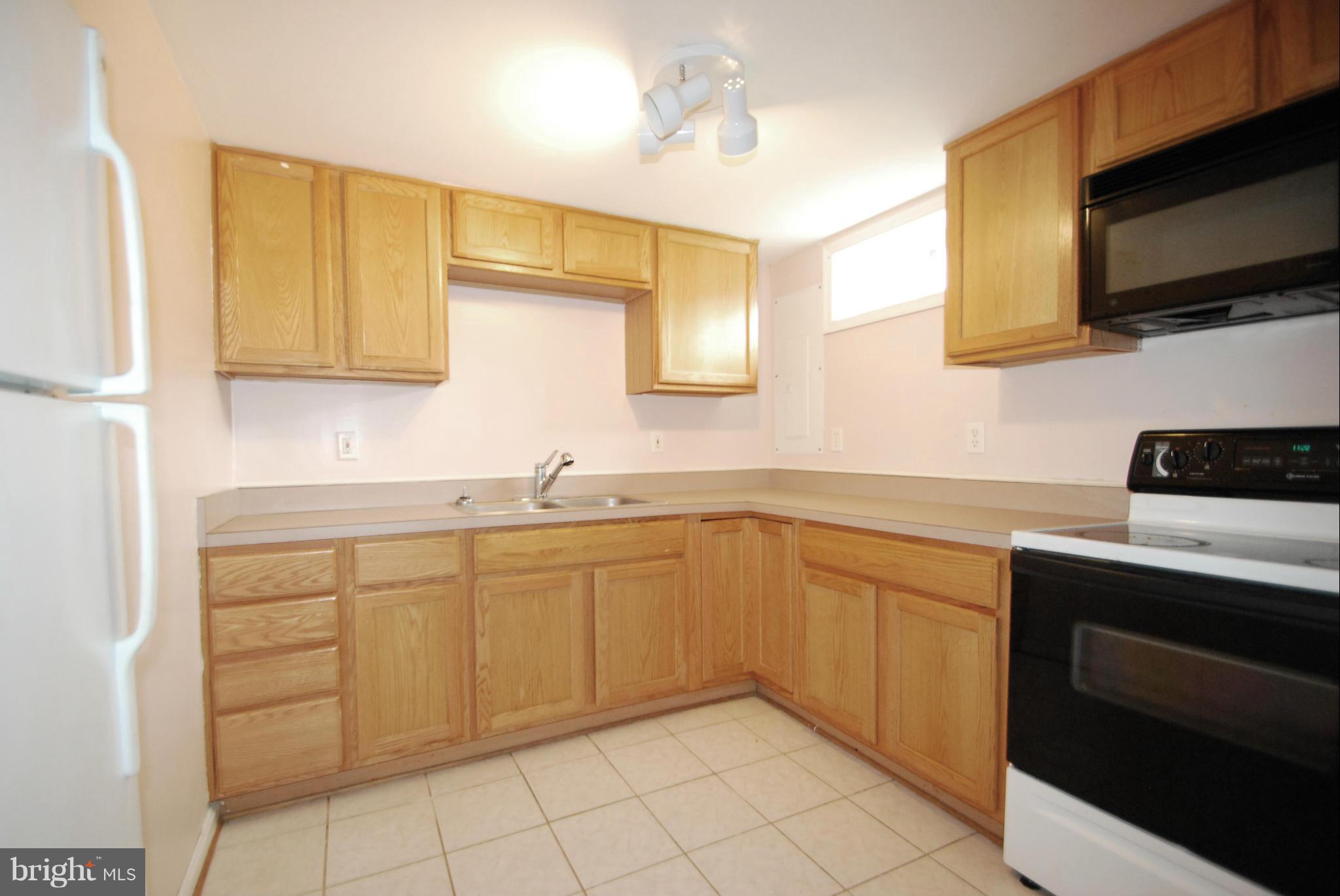 957 Tidewater Road Pasadena, MD 21122 - Photo 17 of 30 Lower Level Kitchen (In-Law Suite)