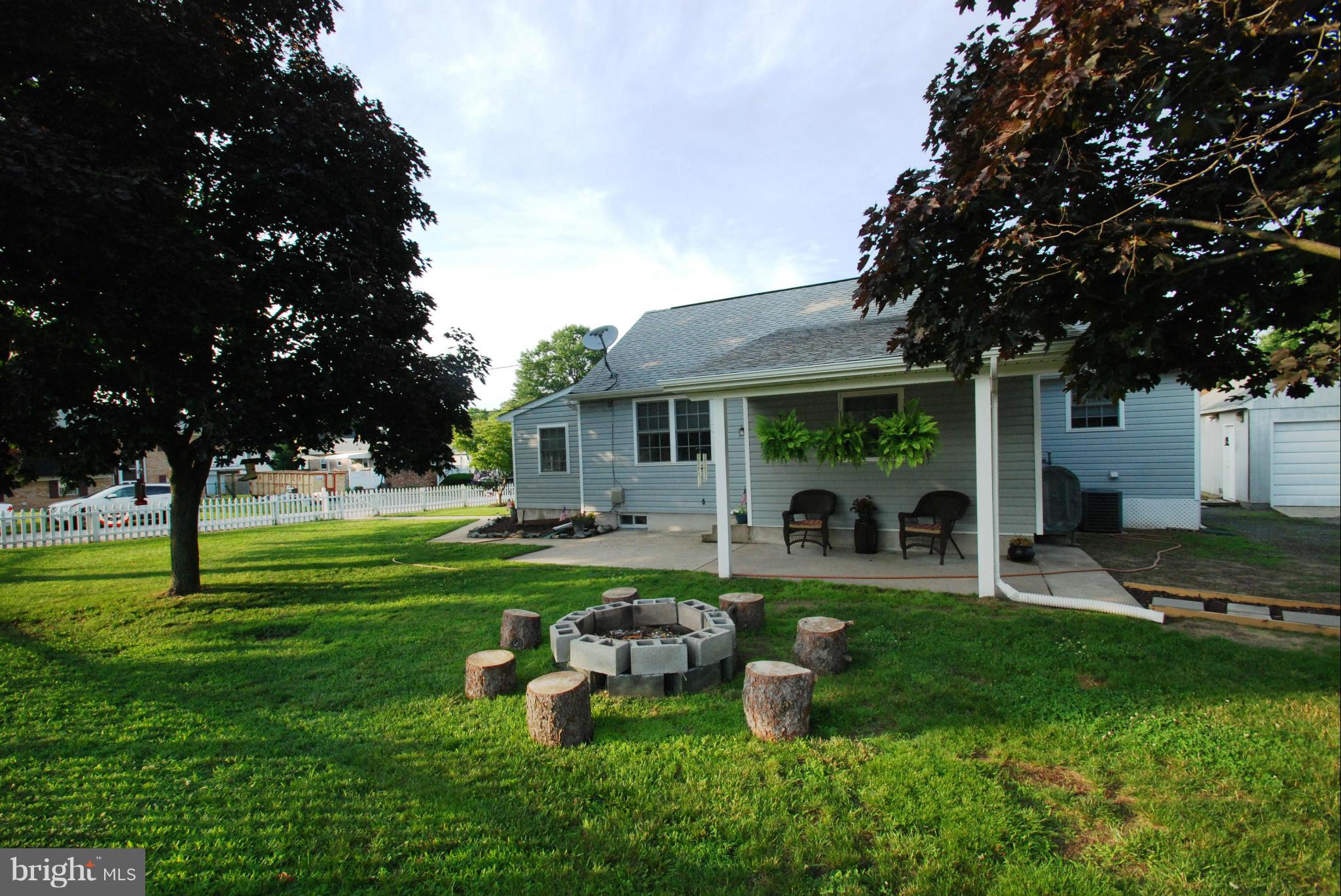957 Tidewater Road Pasadena, MD 21122 - Photo 23 of 30 Side Exterior with Covered Patio Area