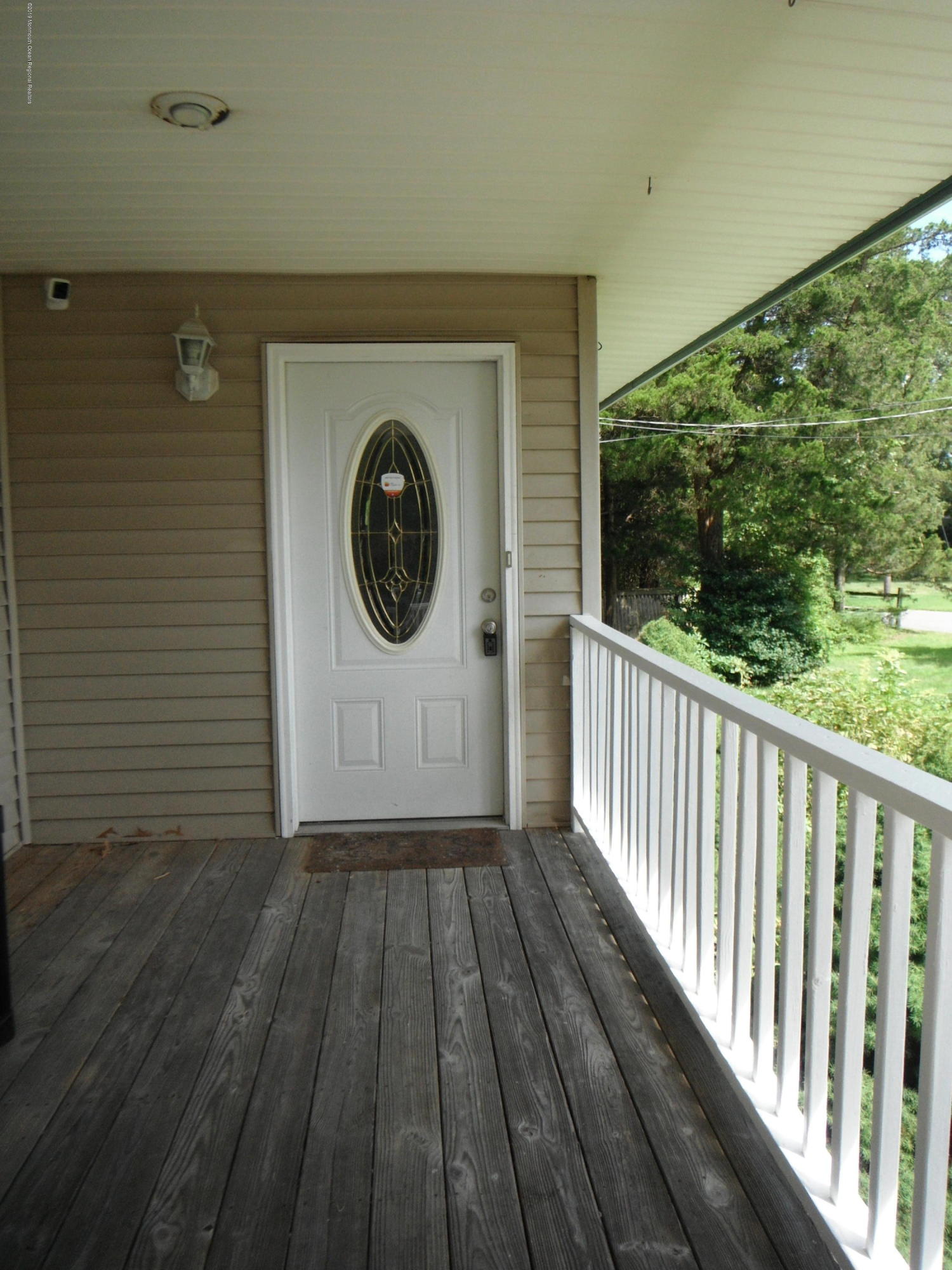 3 Colonial Drive Little Egg Harbor, NJ 08087 - Photo 3 of 21 a view of a wooden door