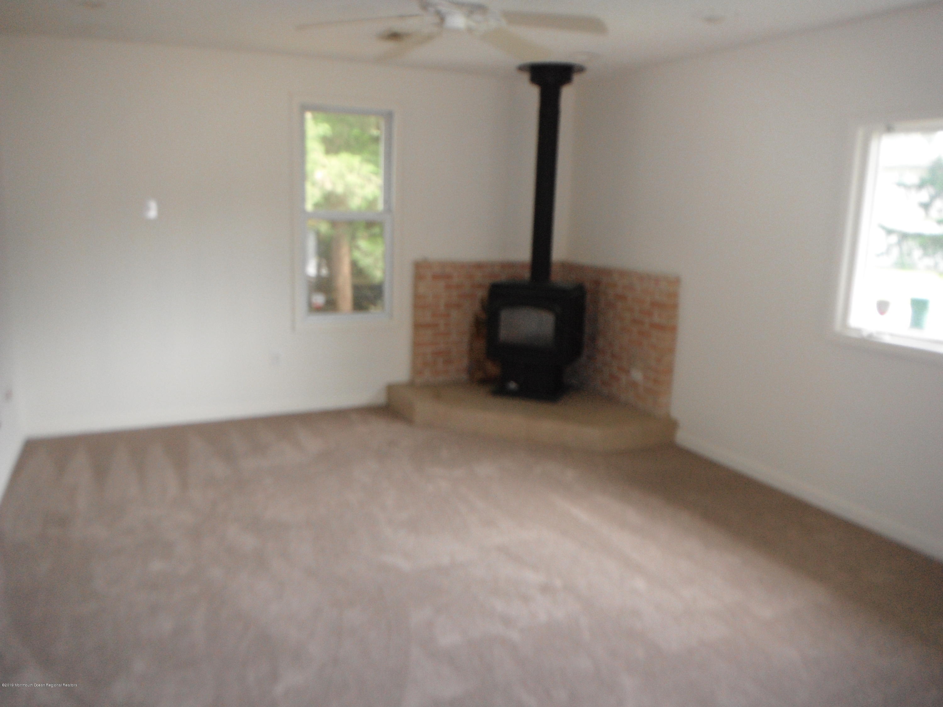 3 Colonial Drive Little Egg Harbor, NJ 08087 - Photo 4 of 21 a view of an empty room with a window
