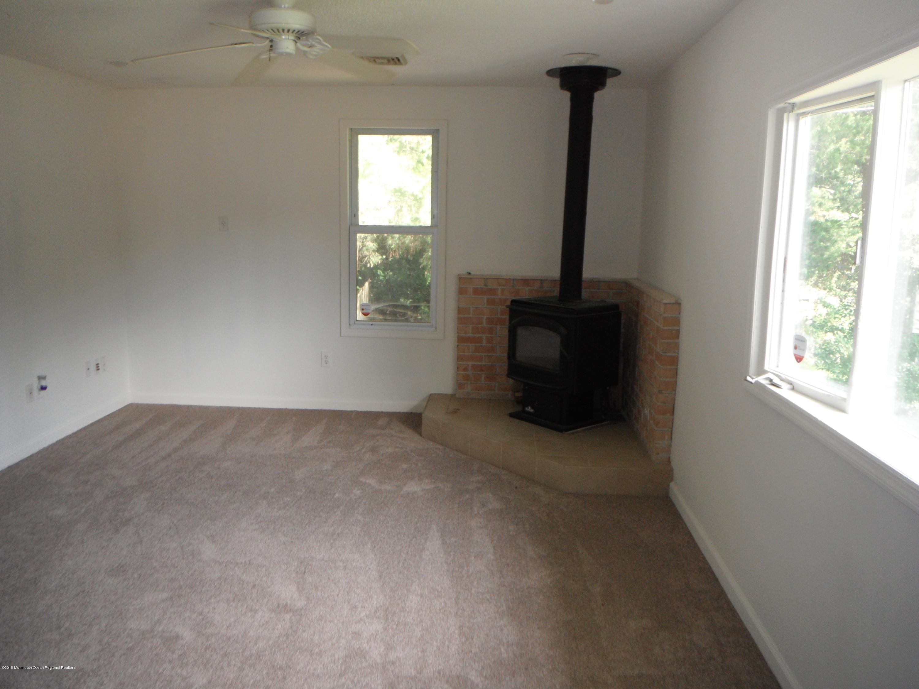 3 Colonial Drive Little Egg Harbor, NJ 08087 - Photo 6 of 21 a living room with furniture and a window