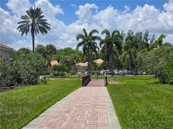a view of a garden with a fountain