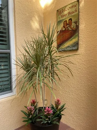 a vase of flowers sitting on a table