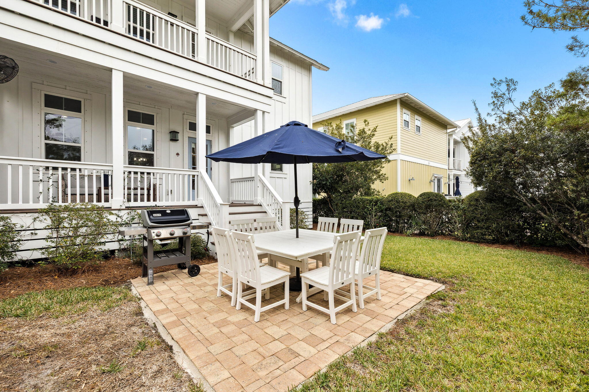 135 Gulfview Circle Santa Rosa Beach, FL 32459 - Photo 12 of 49 a patio with a yard table and chairs