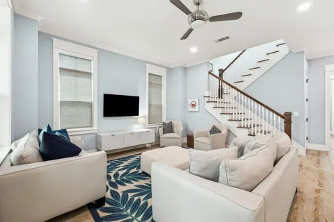 a bathroom with a granite countertop toilet sink and a mirror