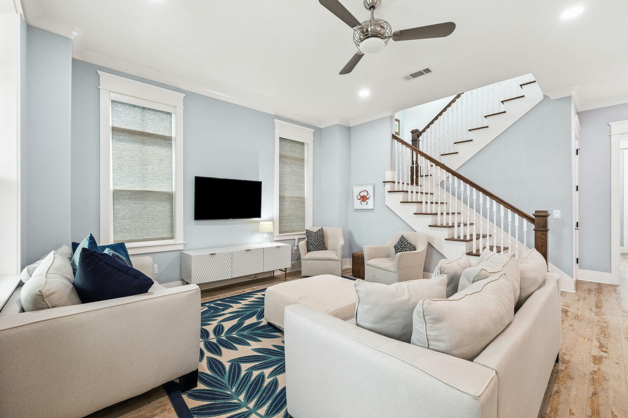 135 Gulfview Circle Santa Rosa Beach, FL 32459 - Photo 17 of 49 a living room with furniture and a flat screen tv
