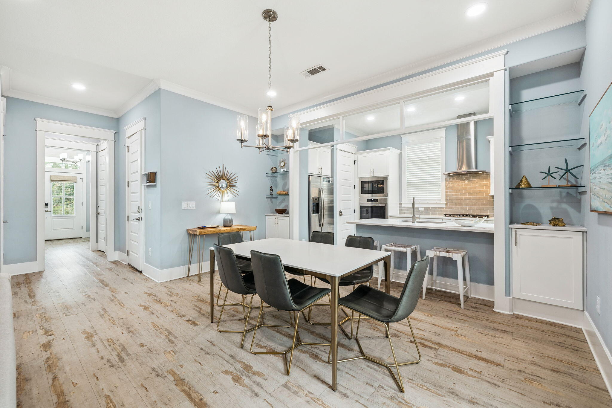 135 Gulfview Circle Santa Rosa Beach, FL 32459 - Photo 20 of 49 a view of a dining room with furniture window and wooden floor