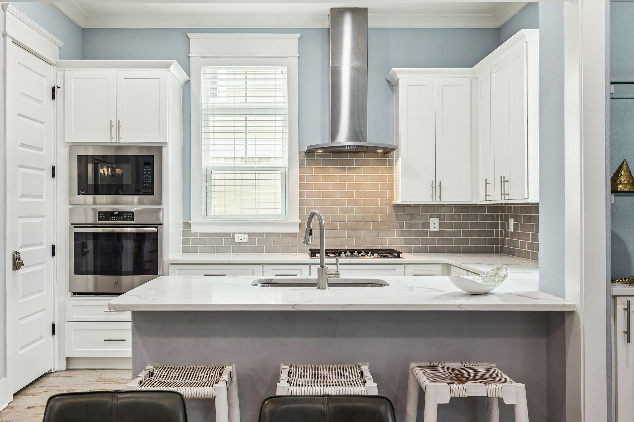 135 Gulfview Circle Santa Rosa Beach, FL 32459 - Photo 23 of 49 a kitchen with stainless steel appliances a sink and a stove
