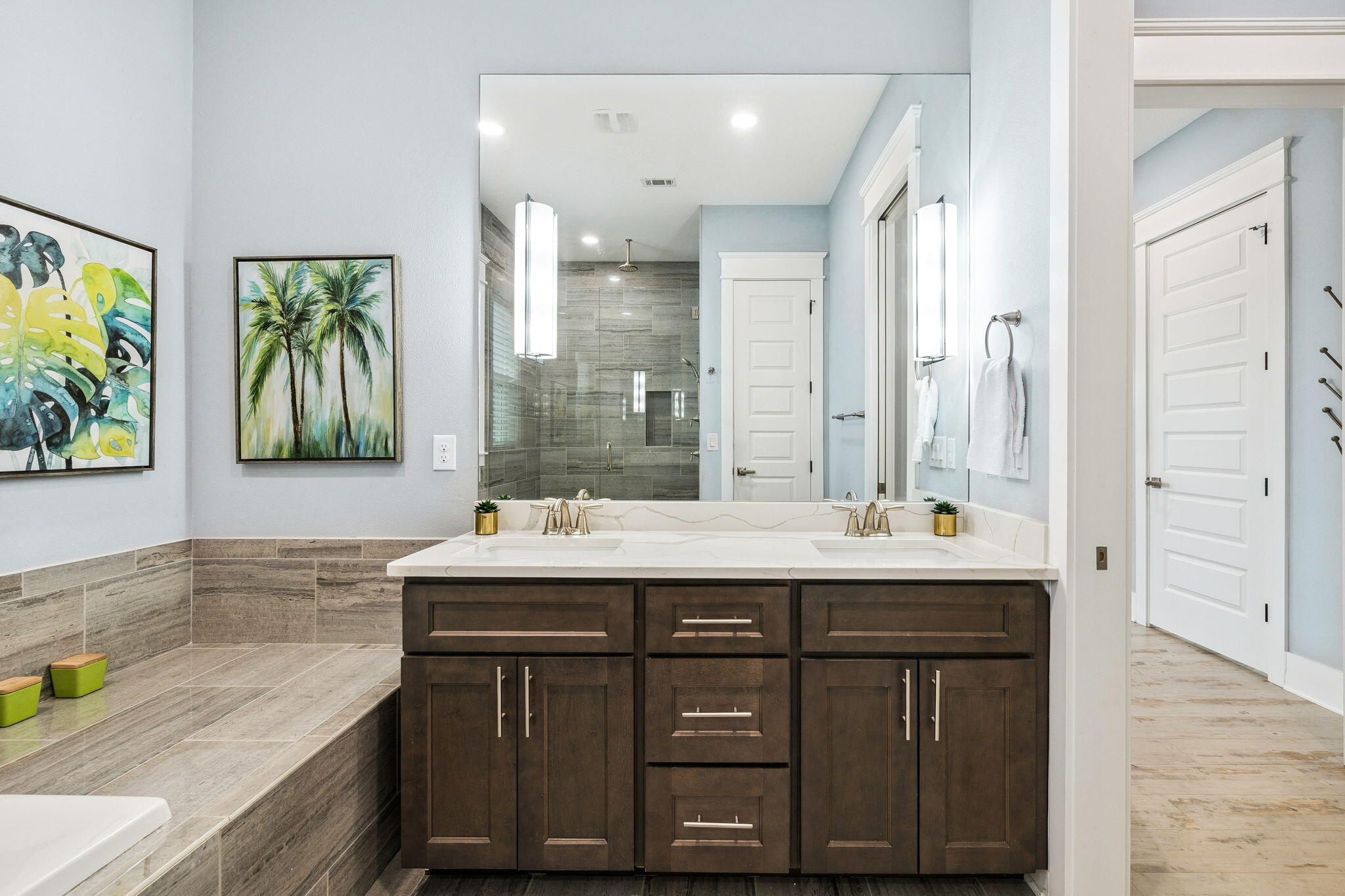 135 Gulfview Circle Santa Rosa Beach, FL 32459 - Photo 38 of 49 a bathroom with a granite countertop sink a large mirror and a bathtub