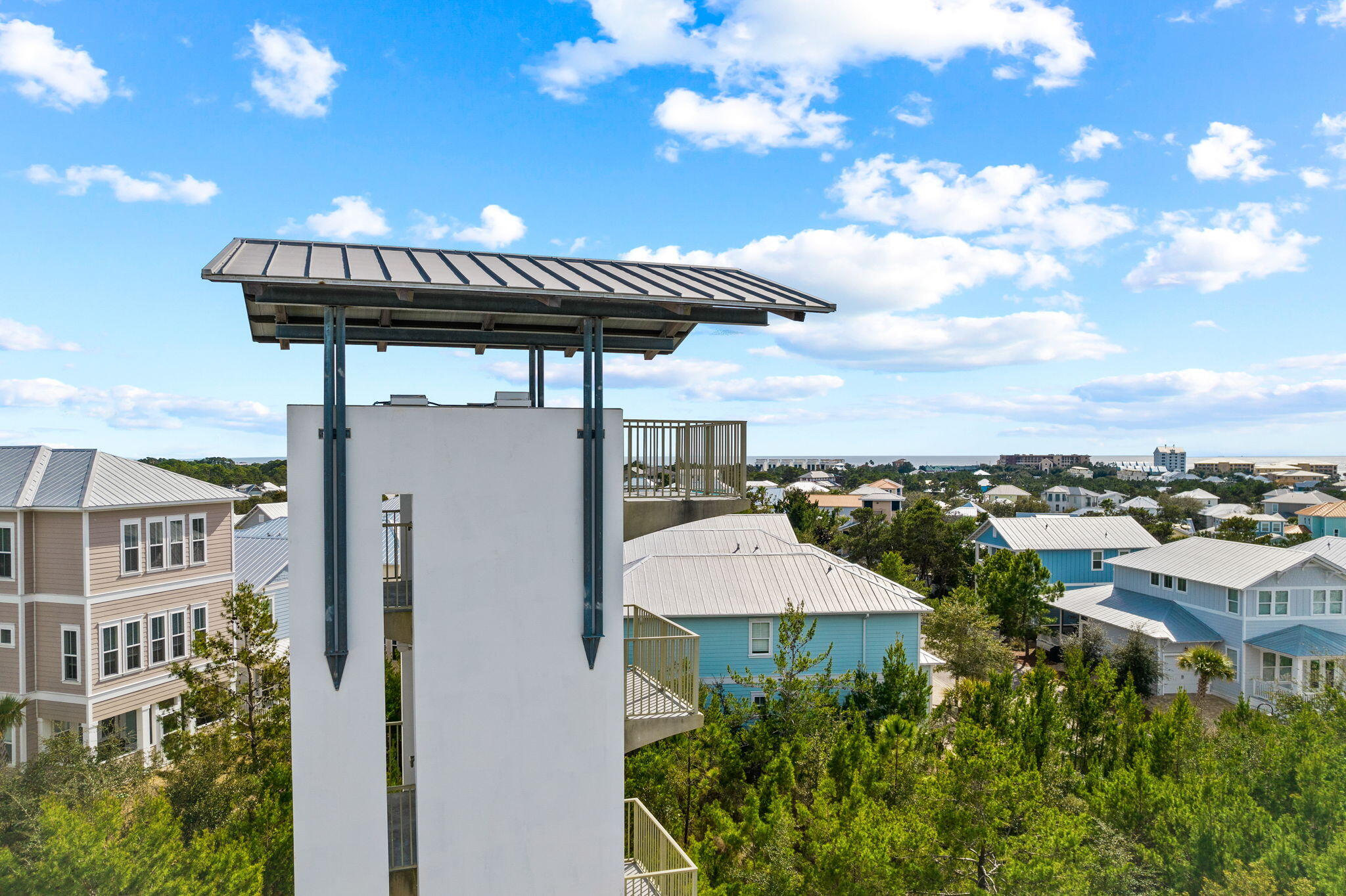135 Gulfview Circle Santa Rosa Beach, FL 32459 - Photo 48 of 49 a view of a patio with a table and chairs under an umbrella