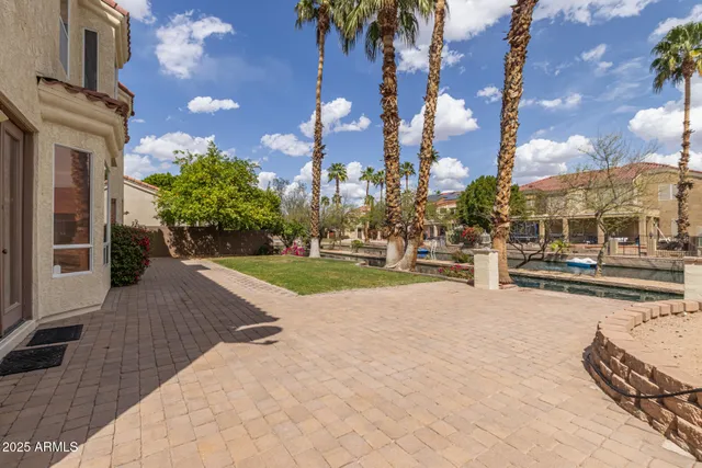 a view of a building with potted plants