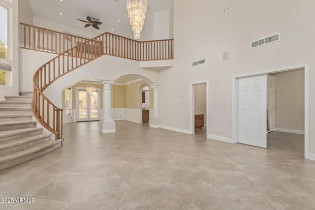 a view of livingroom with furniture and floor to ceiling window