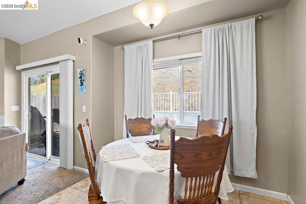 4955 Little John Road Copperopolis, CA 95228 - Photo 10 of 60 a dining room with furniture and window