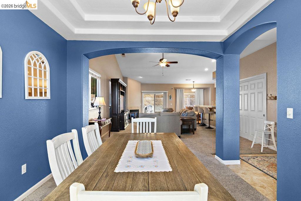 4955 Little John Road Copperopolis, CA 95228 - Photo 22 of 60 a living room with furniture fireplace and wooden floor