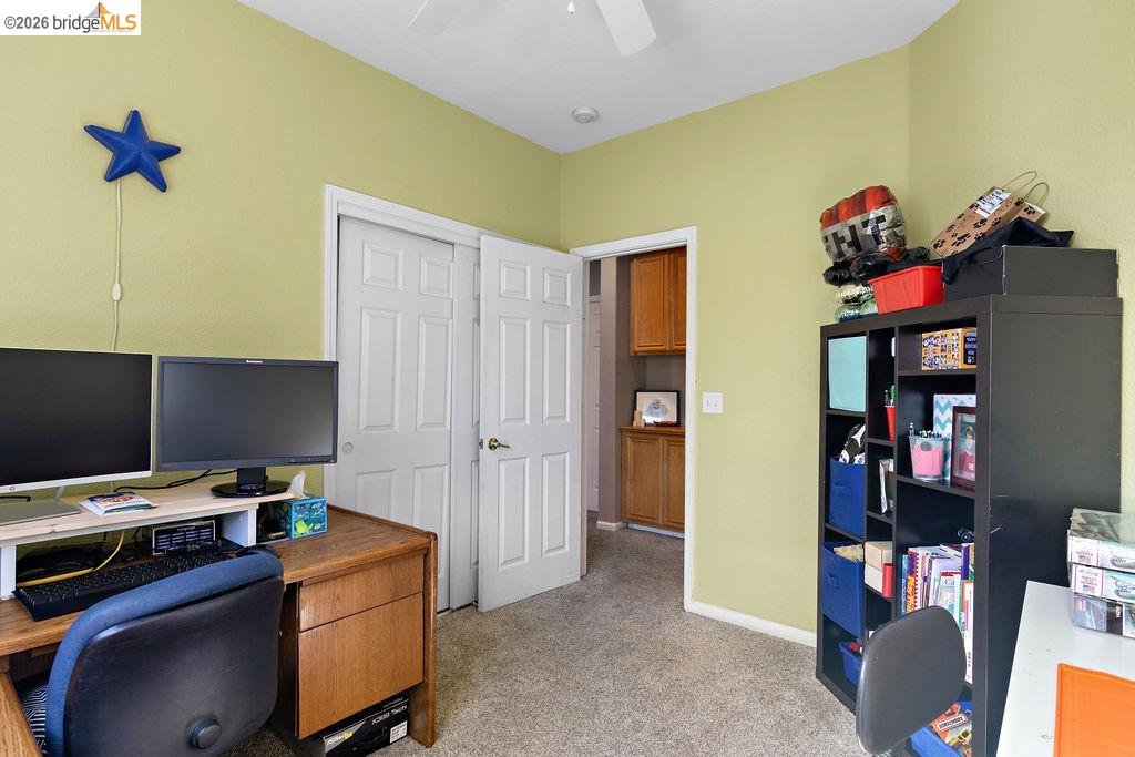 4955 Little John Road Copperopolis, CA 95228 - Photo 27 of 60 a view of a workspace with furniture