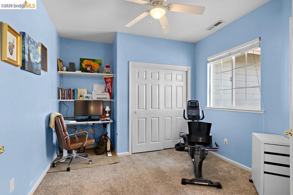 4955 Little John Road Copperopolis, CA 95228 - Photo 29 of 60 a view of a workspace with furniture and a window