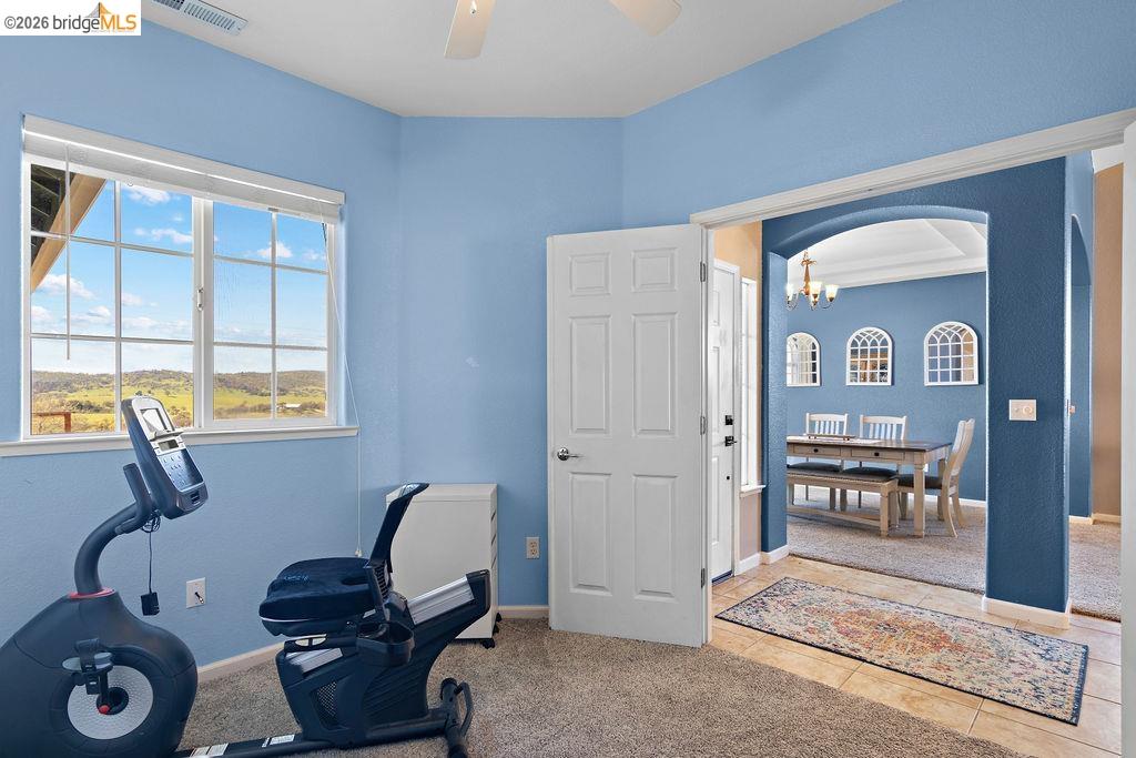 4955 Little John Road Copperopolis, CA 95228 - Photo 30 of 60 a living room with furniture and next to a window