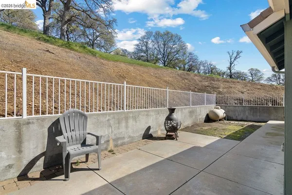 a view of roof with sitting area and furniture